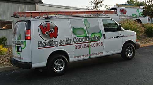 White utility van with W.W. Heaitng & Air Conditioning information printed on the side